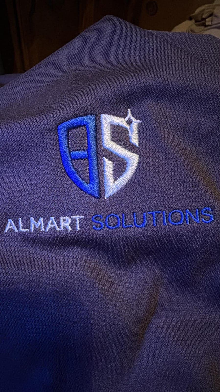 Almart Solutions corporate logo embroidery