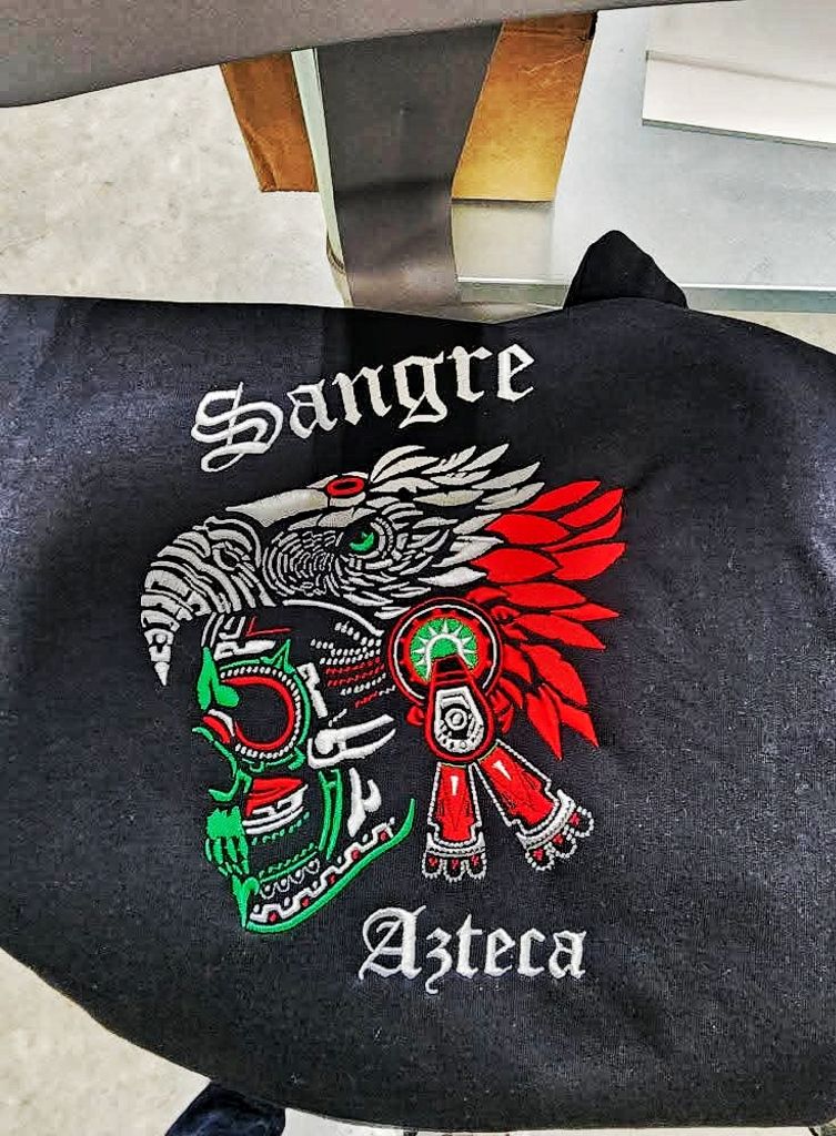 Front chest embroidery sample digitized for readable logo placement.