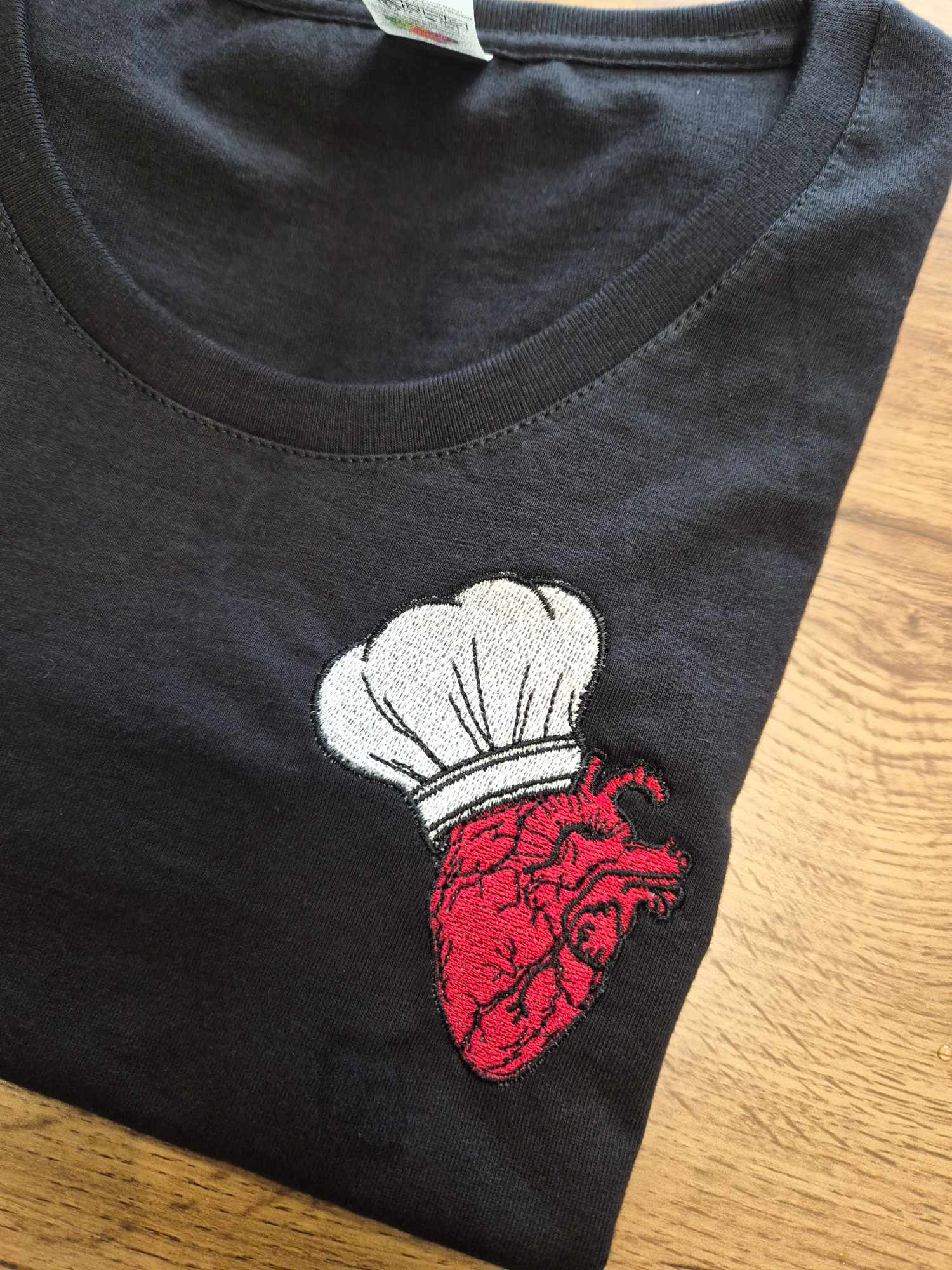 Left chest logo embroidery sample for shirts, polos, and uniforms.